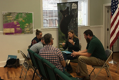 workshop attendees discussing in groups during the breakout session