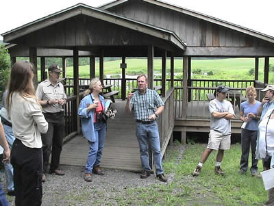 photo of people around shelter - see caption