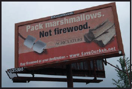 Picture of a sign that says Pack marshmallows. Not firewood.