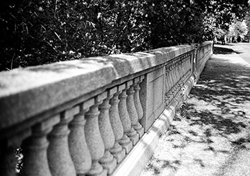 Photograph of an ornate railing of a concrete bridge