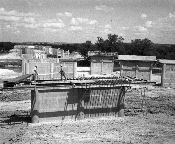 Replicated pier design accelerated construction of bridges for the new Interstate system.  (Image courtesy of Jack Lewis of the Texas Department of Transportation Archive.)