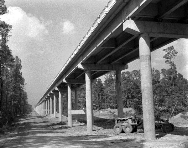 Prefabricated beams eliminated expensive form work and labor at the bridge site.  (Image courtesy of the Texas Department of Transportation.)