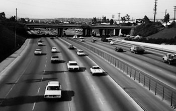Major cities, such as San Diego, met growing user demand by constructing eight-lane freeways.  (Image courtesy of the Inglewood Public Library Historic Photograph Collection)