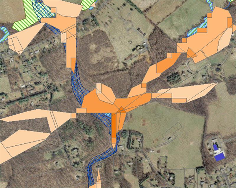 Terrain map from the WRR overlaid with orange, blue, and yellow stripped areas.