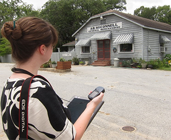 photo of Kristie Persons across the street from the historic country store