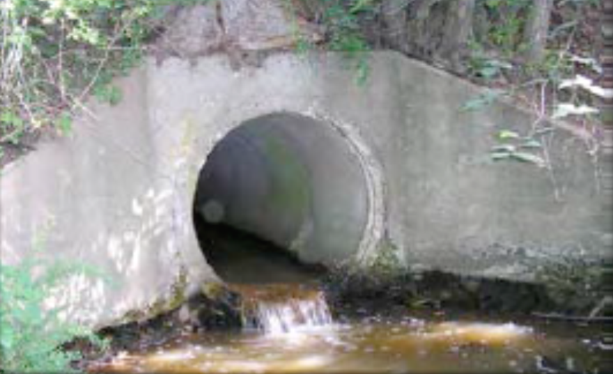 Photo of an undersized bridge culvert