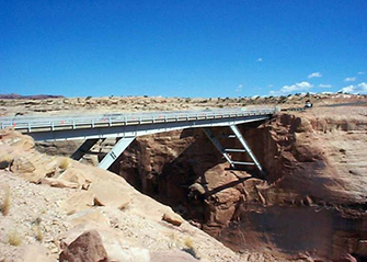 Photograph of Bridge 491, showing a bridge across a canyon between two rock ledges