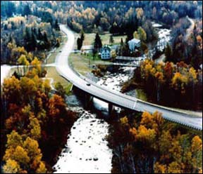 This highway bridge crosses a river and is representative of the complexity of projects and how projects can successfully mix with the natural environment.