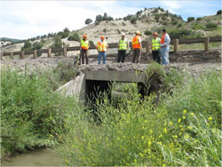 US 6, mile post 203: Before road widening, box culvert replacement with a bridge