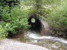 Photo of Mill Creek on SR 2, near Stevens Pass Ski Resort in Washington State before implementation of a fish passage project