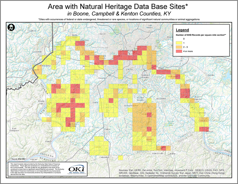 map of the areas with Natural Heritage Data (NHD) base sites in Boone, Campbell, and Kenton counties in Kentucky. These sites are sites with occurrences of Federal or State endangered, threatened or rare species, or locations of significant natural communities or animal aggregations. The map legend uses four different colors to indicate these sites with: 0; 1; 2-3; or 4 or more NHD records per square mile section. The map then shows the location of these sites throughout the three counties.