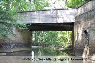 photo of a calm stream under a bridge, courtesy of Atlanta Regional Commission