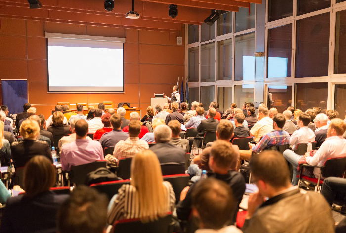 Speaker at Business Conference and Presentation. Audience at the conference hall