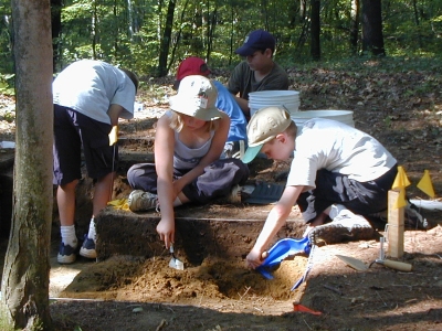 photo of people digging with spades