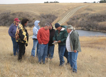 Photograph: North Dakota Department of Transportation Tribal Transportation Committee meeting in the field.