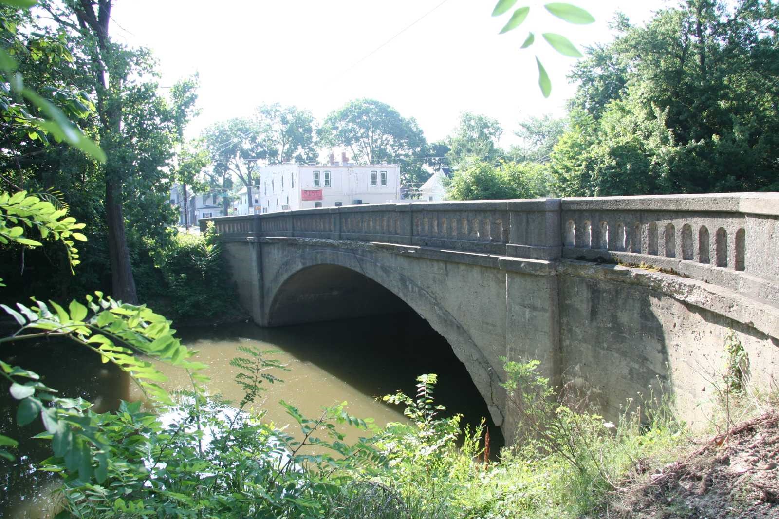 A bridge spanning over a riverway.