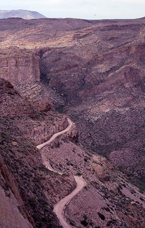 Photograph of a section of the Apache Trail winding along a mountainside