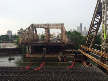 Photograph of the original East Division Street bridge during demolition